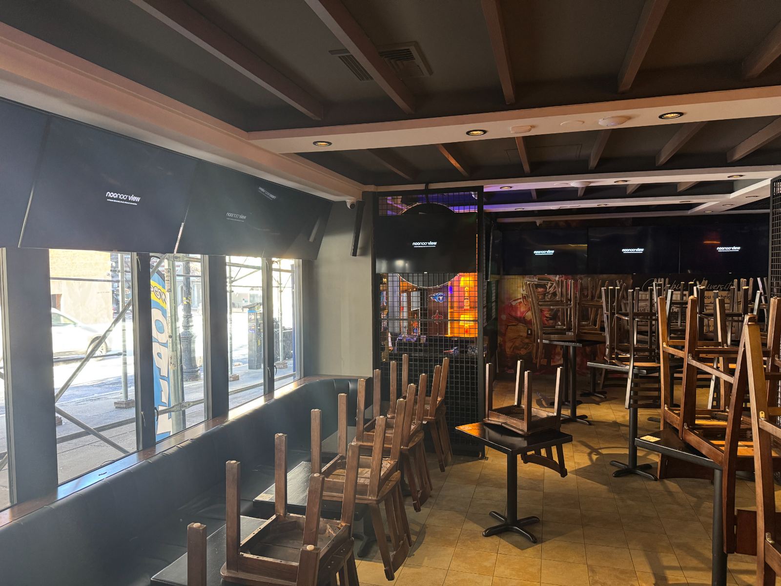 The dining room in daylight with displays along the wall