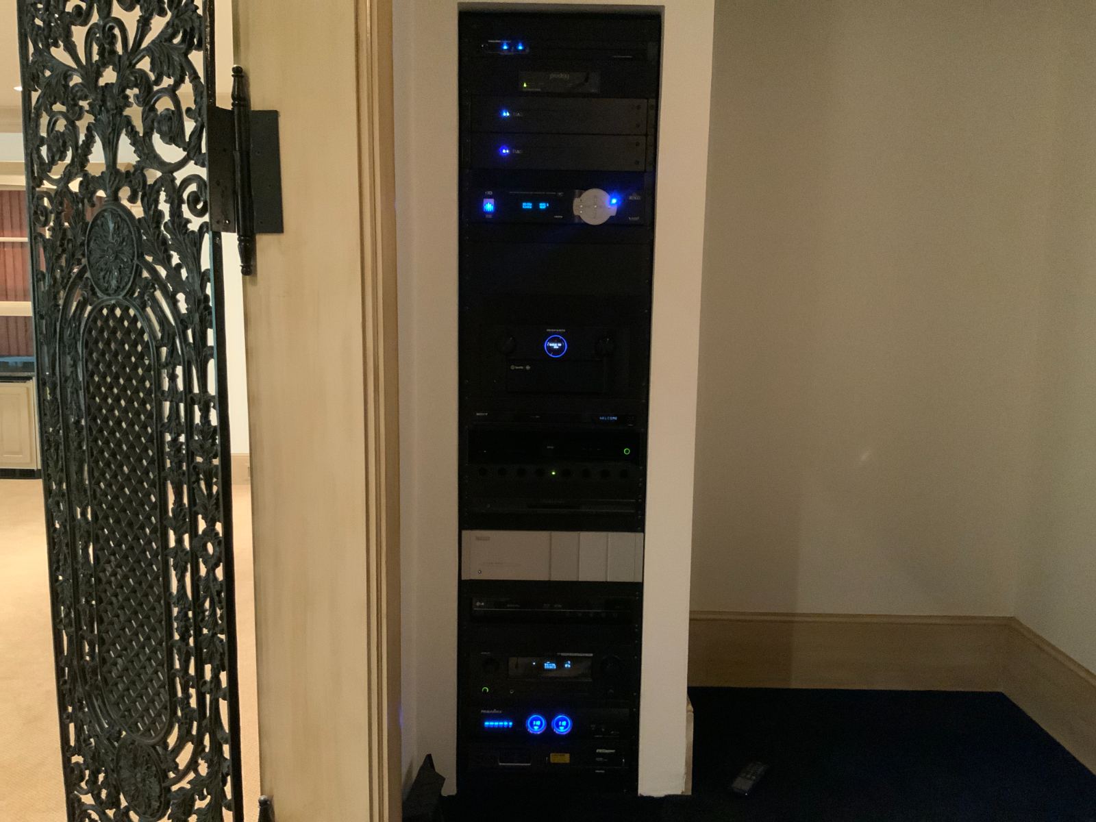 An equipment rack built into the room's millwork