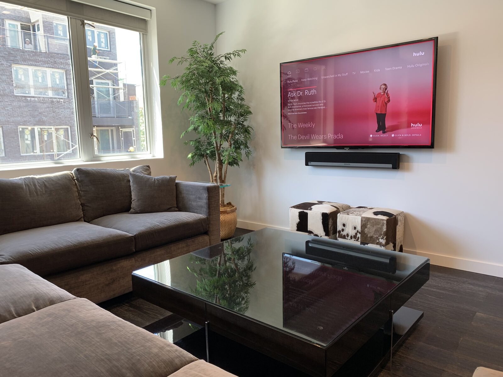 The open living space with the display on the far wall